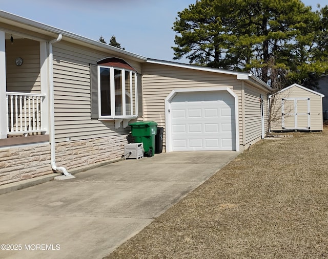 view of property exterior with driveway, stone siding, a shed, an outdoor structure, and an attached garage