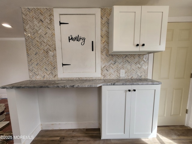 interior space with recessed lighting, tasteful backsplash, and dark wood-type flooring