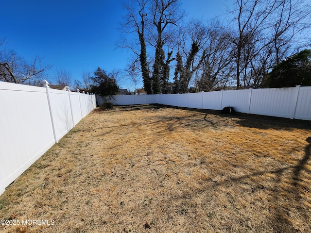 view of yard featuring a fenced backyard