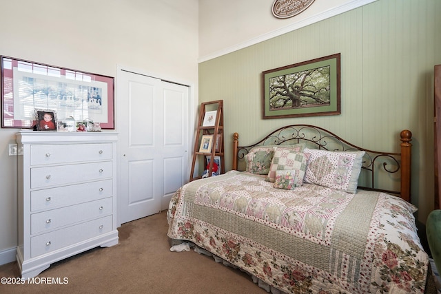 carpeted bedroom with a closet