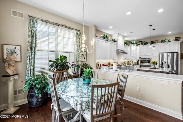 dining space featuring dark wood finished floors, recessed lighting, visible vents, and baseboards