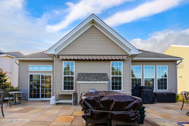 view of patio featuring a grill