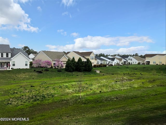 view of yard featuring a residential view