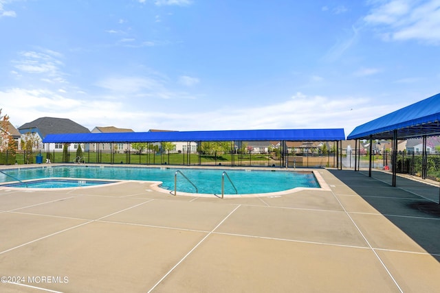 pool featuring fence