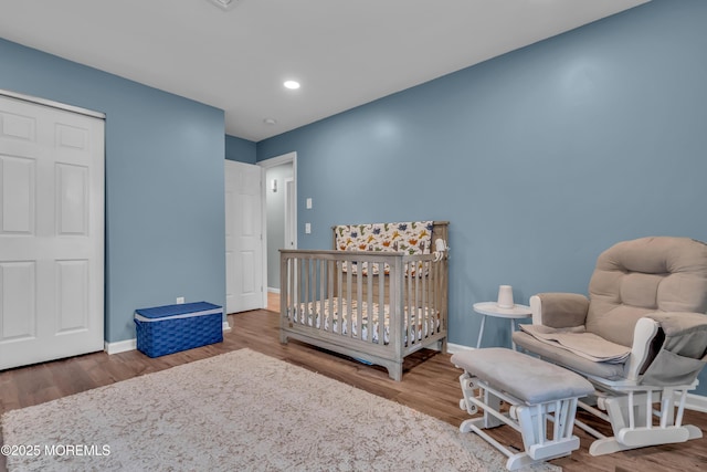 bedroom featuring recessed lighting, baseboards, and wood finished floors