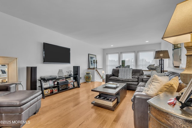 living room with recessed lighting and light wood-type flooring