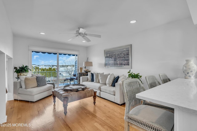 living room with recessed lighting, ceiling fan, and wood finished floors