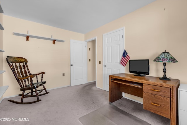 carpeted office with baseboards