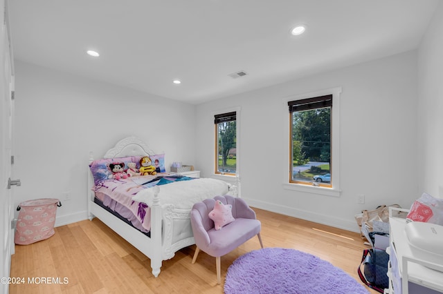 bedroom with recessed lighting, visible vents, baseboards, and light wood-style flooring