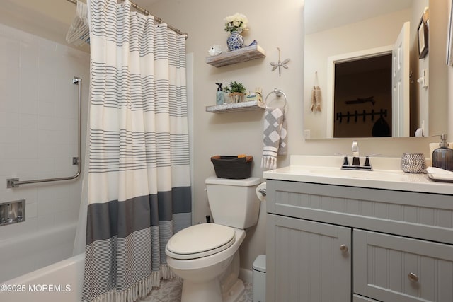 bathroom with shower / bath combination with curtain, toilet, and vanity