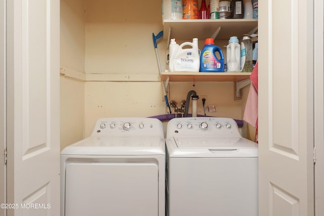 clothes washing area with laundry area and washing machine and clothes dryer