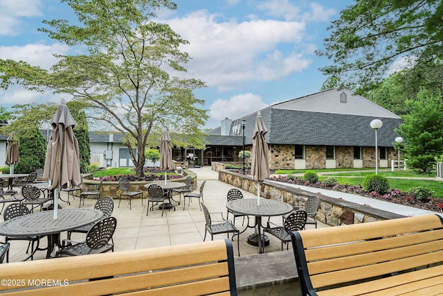 view of patio featuring outdoor dining space and an outdoor living space