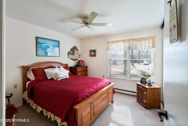 bedroom featuring light carpet, a ceiling fan, and a baseboard radiator