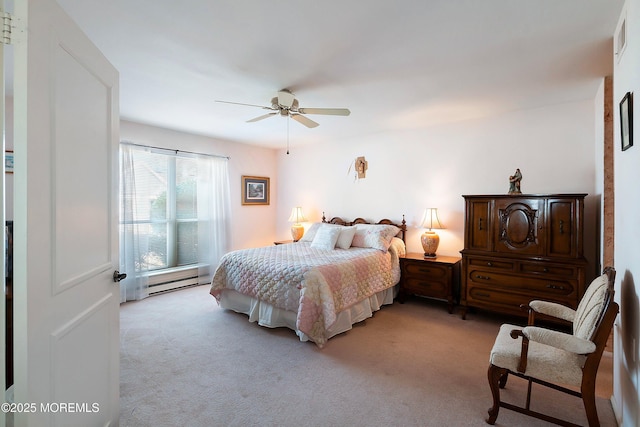 bedroom featuring visible vents, light colored carpet, a baseboard heating unit, and ceiling fan