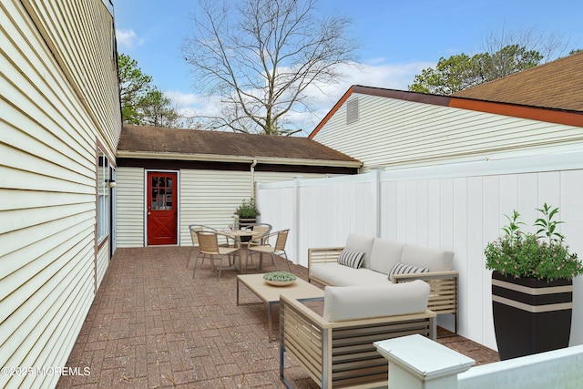 749A Liverpool Cir Unit 749A, Manchester, NJ 08759 - view of patio featuring outdoor lounge area, outdoor dining area, and fence