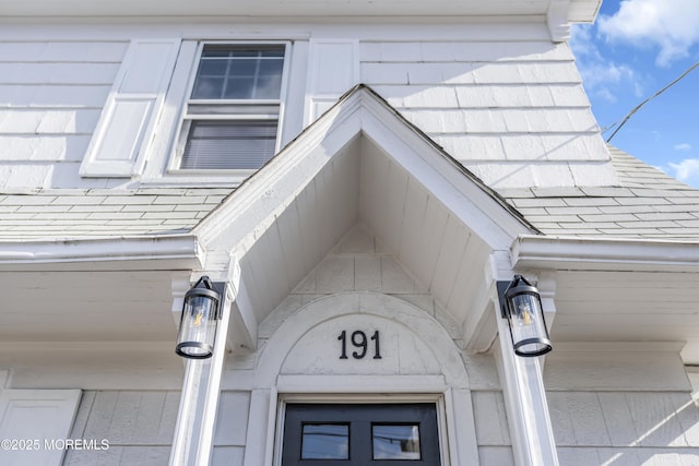 details featuring a shingled roof