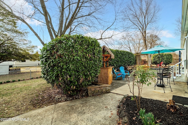 view of patio with fence