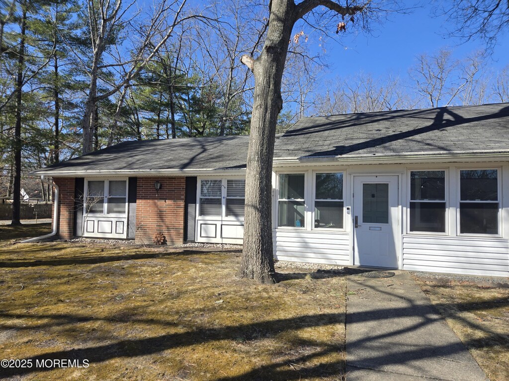 view of front of property with brick siding