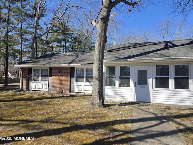 view of front of property with brick siding