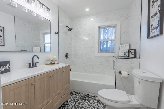 bathroom featuring visible vents, vanity, toilet, and  shower combination