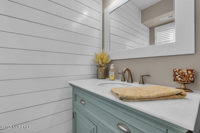 bathroom featuring visible vents and vanity