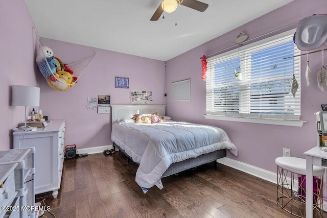 bedroom featuring wood finished floors, baseboards, and ceiling fan