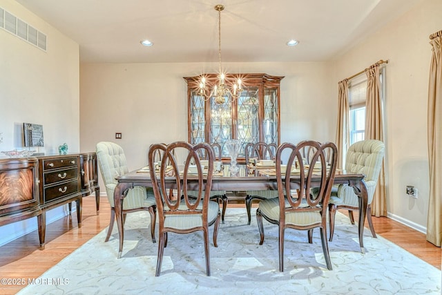 2 Kristen Ct, Franklin Twp, NJ 08873 - dining area featuring baseboards, visible vents, light wood-style flooring, recessed lighting, and a chandelier