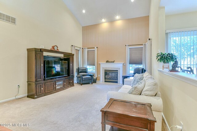 2 Kristen Ct, Franklin Twp, NJ 08873 - living area featuring visible vents, baseboards, carpet, and high vaulted ceiling