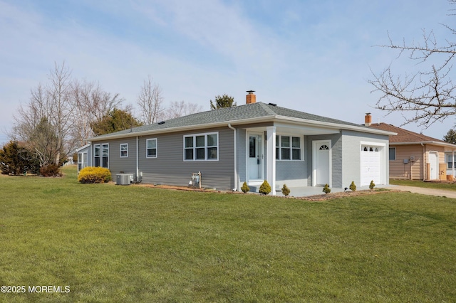 single story home featuring cooling unit, driveway, a chimney, a front lawn, and a garage