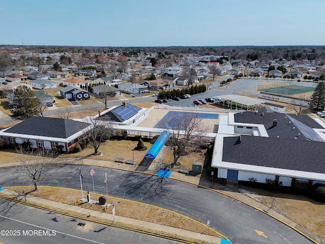 birds eye view of property with a residential view