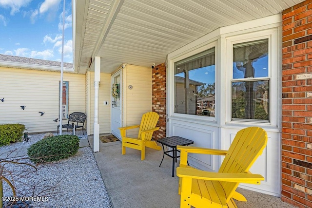 view of patio featuring a porch