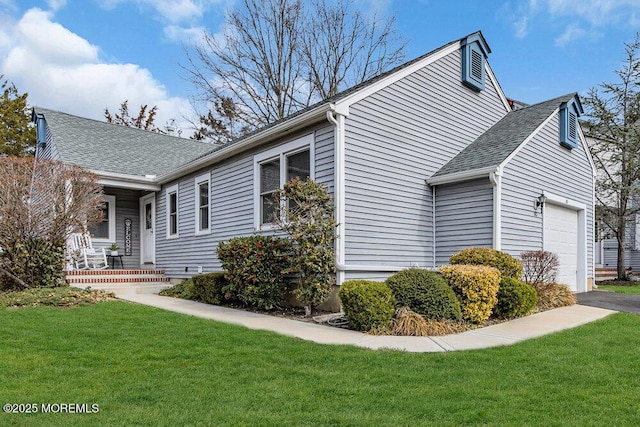 30 Turnberry Cir, Toms River, NJ 08753 - view of home's exterior with a porch, an attached garage, a lawn, and roof with shingles