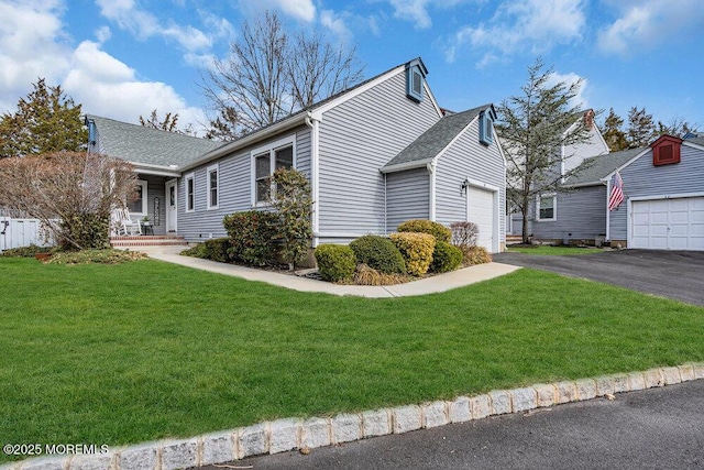 30 Turnberry Cir, Toms River, NJ 08753 - view of home's exterior with aphalt driveway, an attached garage, and a yard