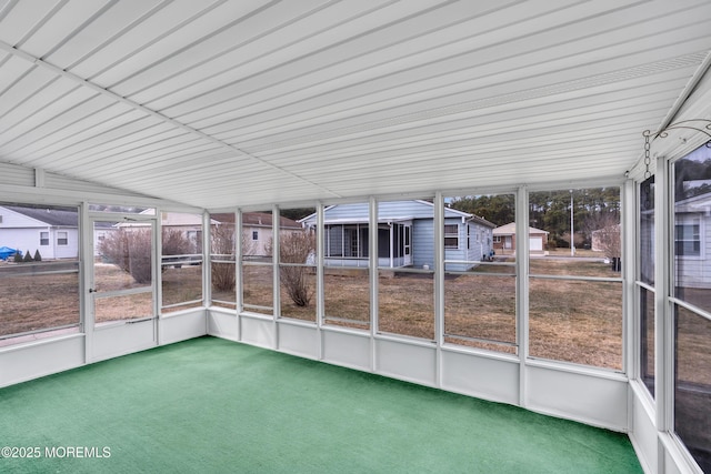 unfurnished sunroom with plenty of natural light