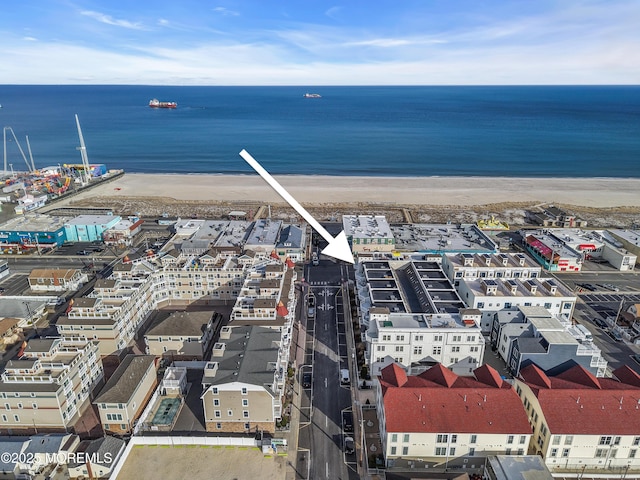 aerial view featuring a beach view and a water view