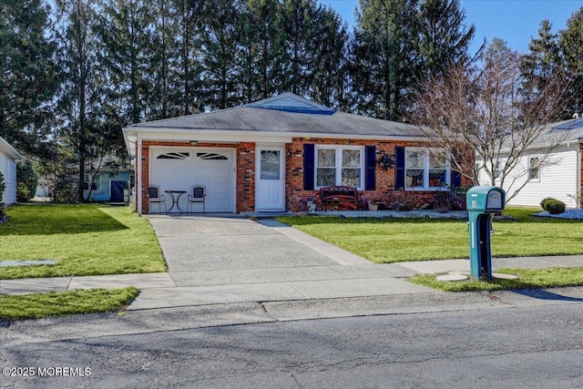 view of front of property featuring brick siding, an attached garage, driveway, and a front lawn