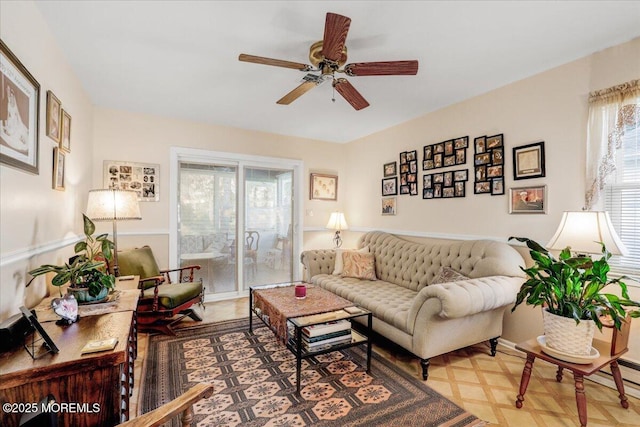 living room featuring ceiling fan