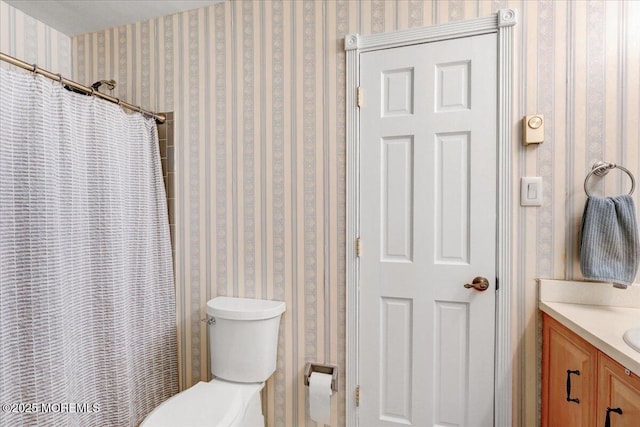 full bath with toilet, curtained shower, wallpapered walls, and vanity