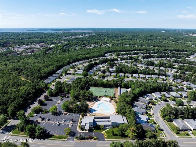 bird's eye view featuring a forest view