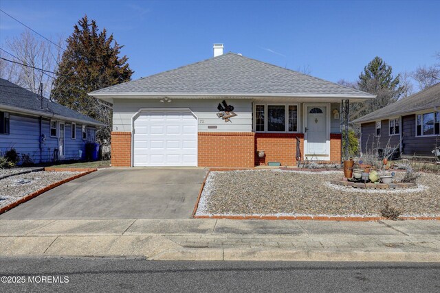 72 Mount Matterhorn Ln, Toms River, NJ 08753 - view of front of property with concrete driveway, an attached garage, brick siding, and a shingled roof
