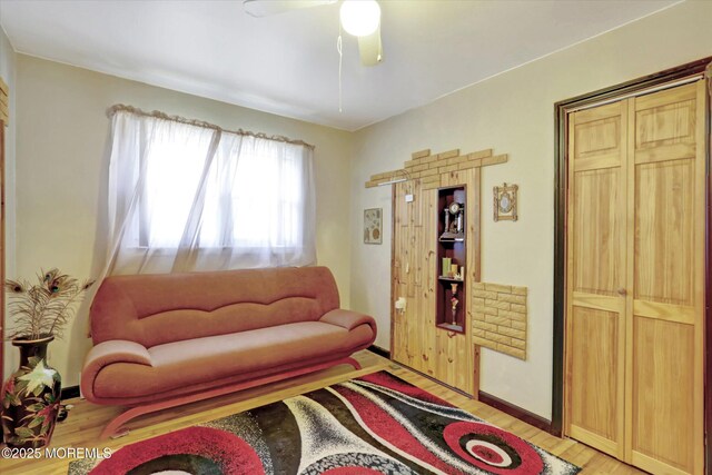 72 Mount Matterhorn Ln, Toms River, NJ 08753 - living area with a ceiling fan, light wood-type flooring, and baseboards