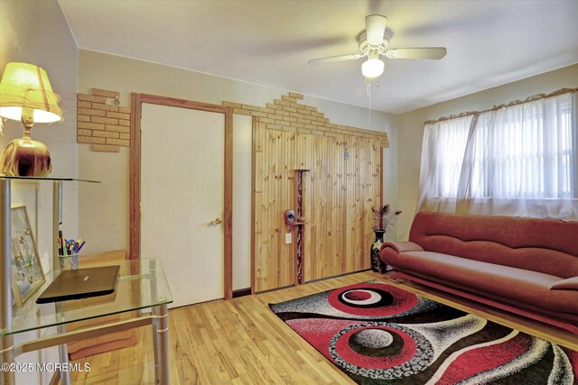 72 Mount Matterhorn Ln, Toms River, NJ 08753 - living room with wood finished floors and a ceiling fan