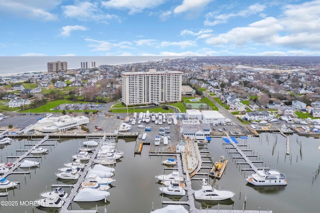 aerial view featuring a water view and a city view