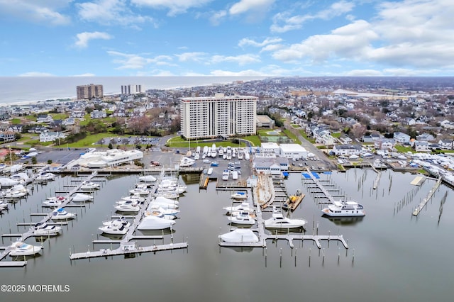 bird's eye view with a water view and a city view