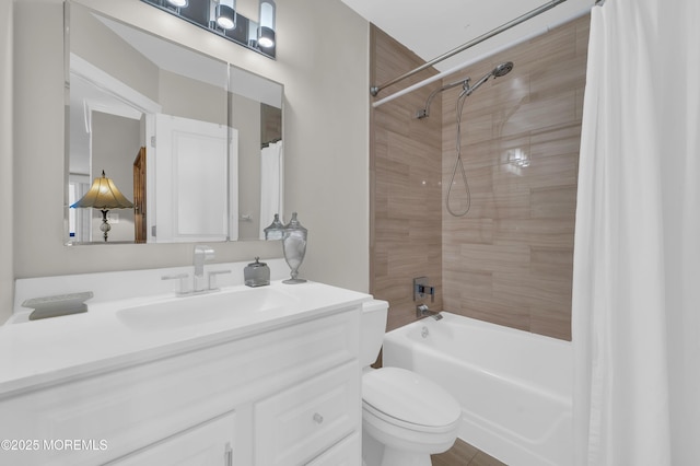 bathroom featuring vanity, toilet, and shower / bath combo