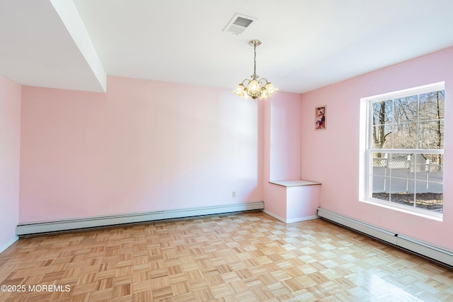 empty room featuring a chandelier, visible vents, a baseboard heating unit, and baseboards