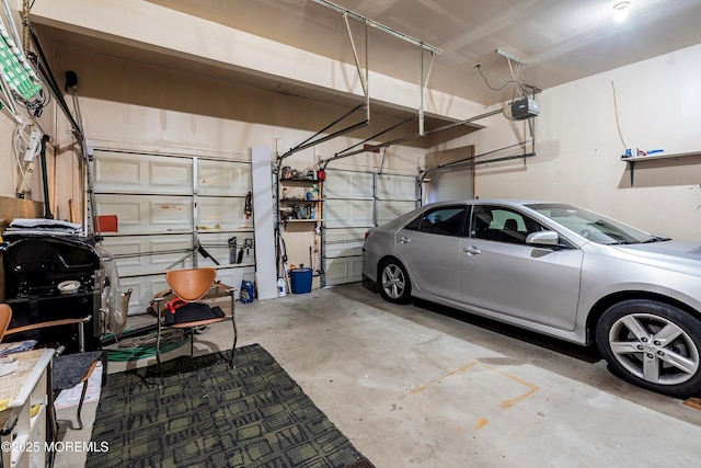 garage featuring a garage door opener