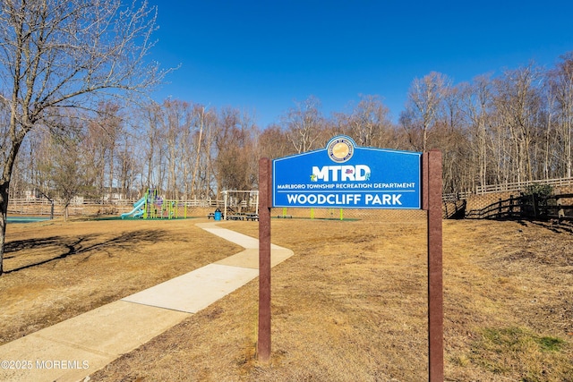 view of home's community with playground community