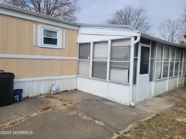 15 Wistoria Dr, Jackson, NJ 08527 - view of side of home featuring a sunroom