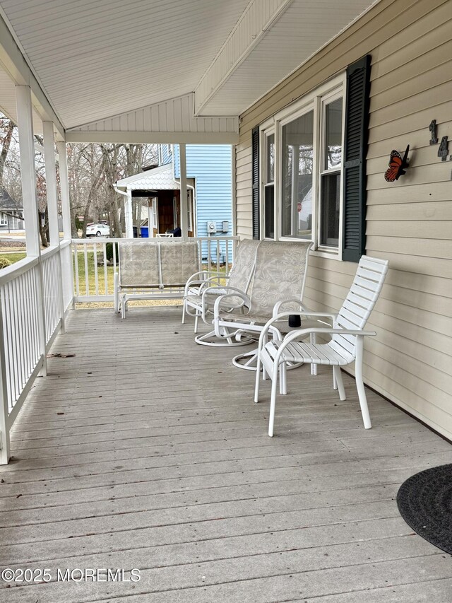 wooden deck with covered porch